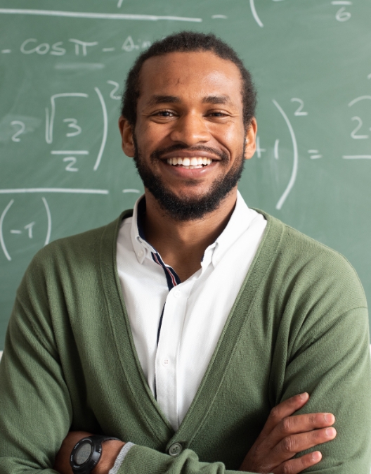 Teacher and students in a diverse classroom