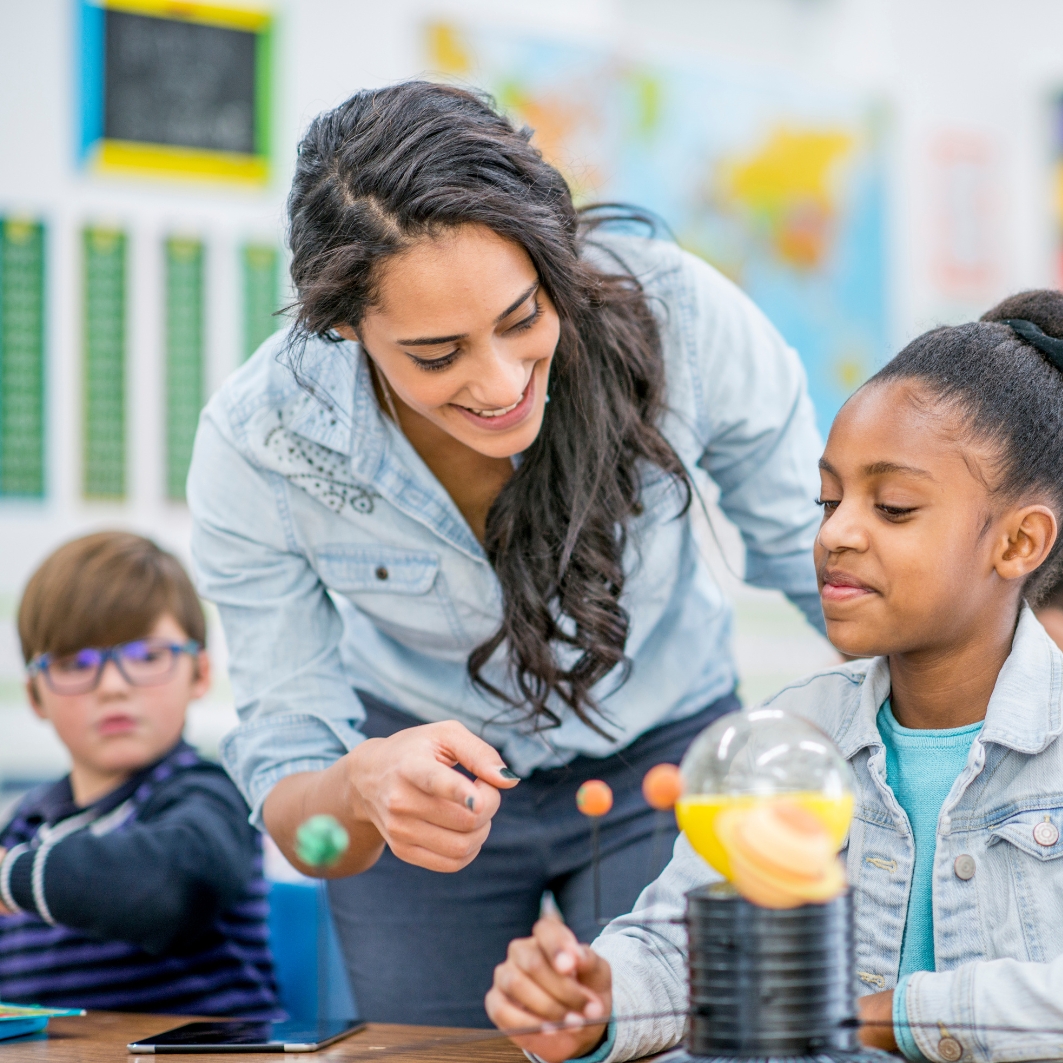 Students collaborating in a diverse classroom